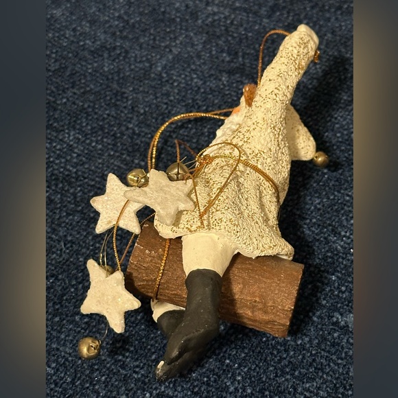 Wild western Santa hangs from gold thread with stars and bells. - Picture 7 of 8